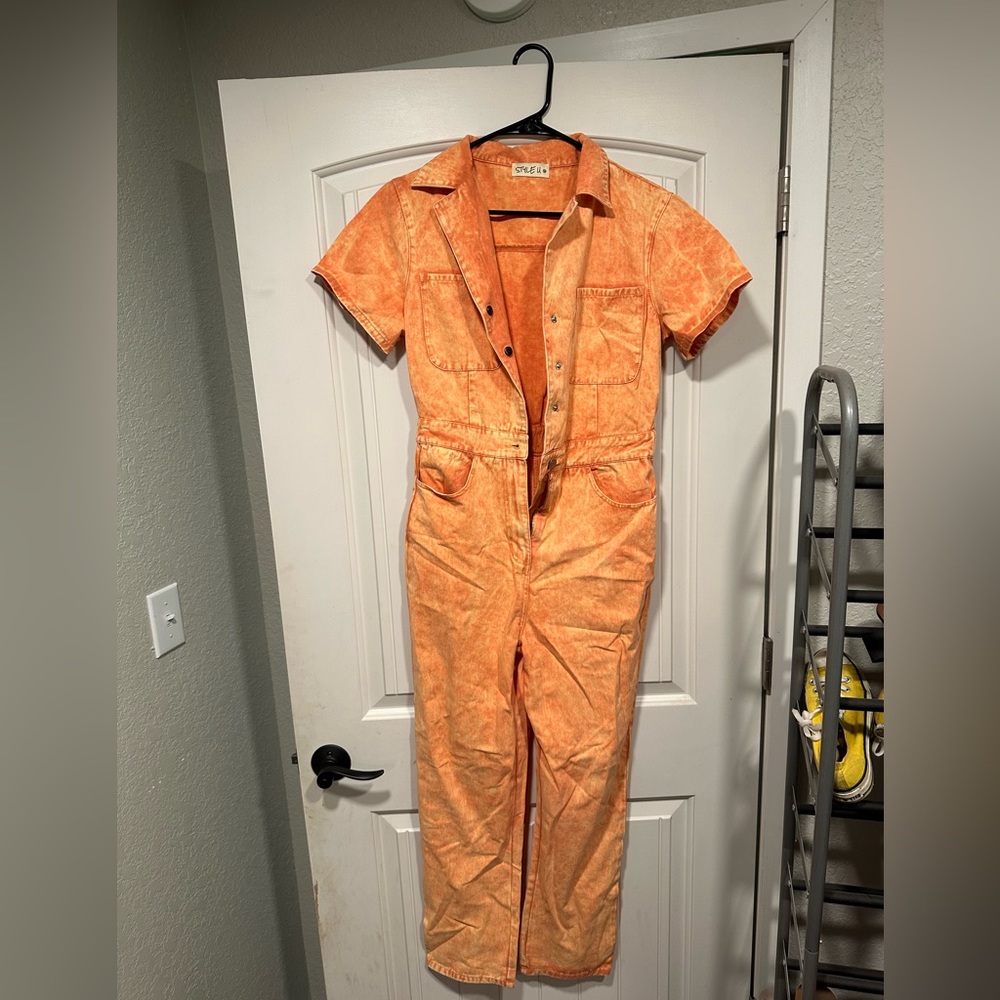 Size M orange jumpsuit never worn!